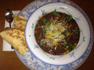 Black Bean Soup served with a Cheese Quesadilla.